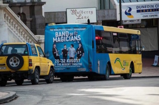 band of magicians all over buses across new zealand
